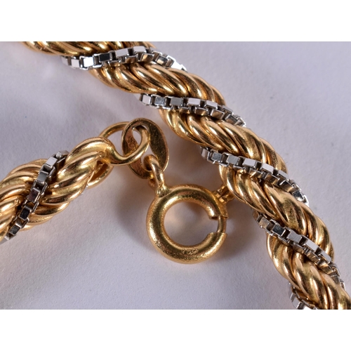 1233 - An 18ct Two Tone Gold Rope Necklace.  Stamped 18K, Length 50cm, weight 32.3g