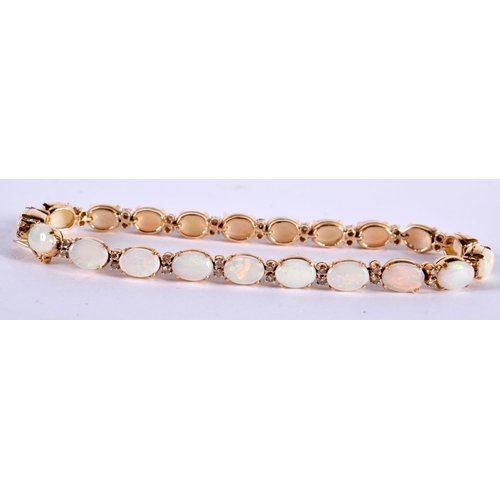 1235 - An 18 Ct Gold Opal and Diamond Bracelet in original case.  Stamped 18K, length 18.5cm, weight 13.2g