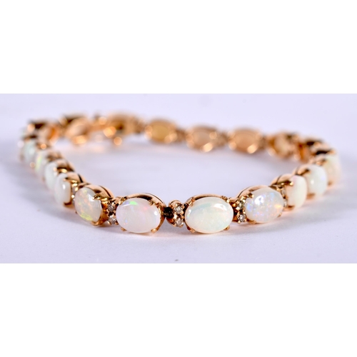 1235 - An 18 Ct Gold Opal and Diamond Bracelet in original case.  Stamped 18K, length 18.5cm, weight 13.2g