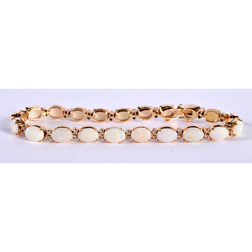 1235 - An 18 Ct Gold Opal and Diamond Bracelet in original case.  Stamped 18K, length 18.5cm, weight 13.2g