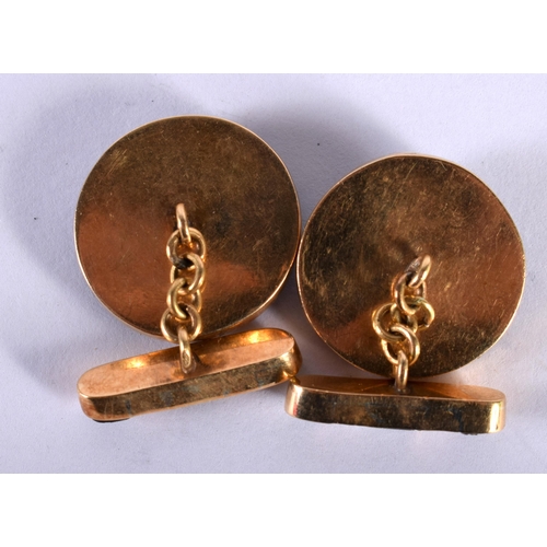 1241 - A Pair of Gold Cufflinks Set with Diamonds on Black Onyx.  2.1cm diameter, total weight 20.5g