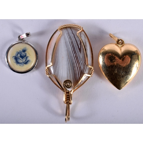 1242 - An 18ct Gold Heart Pendant Stamped 750, together with a Botswana Agate Pendant and another (3)