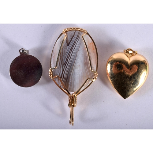 1242 - An 18ct Gold Heart Pendant Stamped 750, together with a Botswana Agate Pendant and another (3)