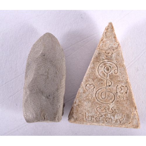 1436 - TWO SOUTH EAST ASIAN AMULETS. Largest 2 cm x 1 cm. (2)