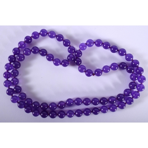 1437 - A Lavender Jade Necklace.  68cm long, Bead size 8.1mm, weight 60g