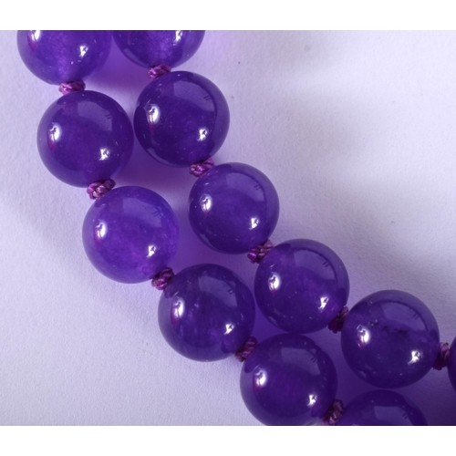 1437 - A Lavender Jade Necklace.  68cm long, Bead size 8.1mm, weight 60g