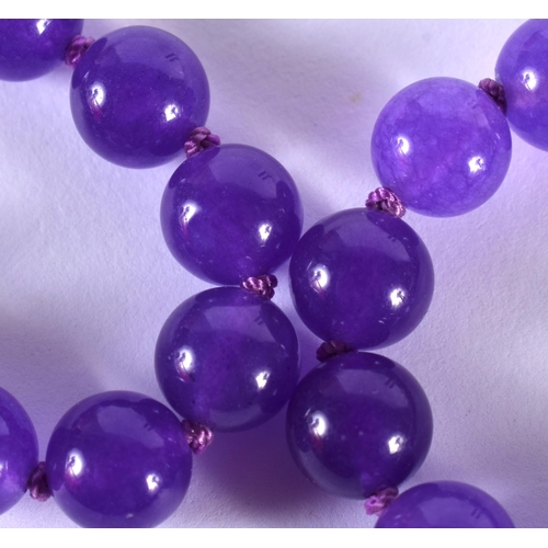 1437 - A Lavender Jade Necklace.  68cm long, Bead size 8.1mm, weight 60g