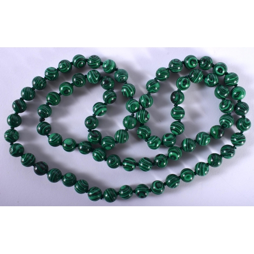 1438 - A Malachite Bead Necklace.  88cm long, Bead size 10.1mm, weight 96.7g