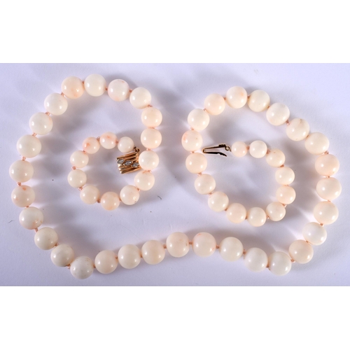 1440 - A White Coral Graduated Necklace with 14ct Gold Clasp.  Stamped 14K.  Length 59cm, Largest Bead 10.6... 