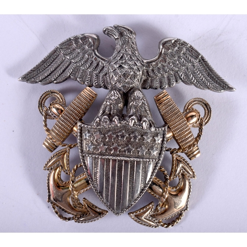 1444 - A Silver and Gold Eagle Badge.  Stamped Sterling and 1/2  10K,  6cm x 5.5c,, weight 17.1g