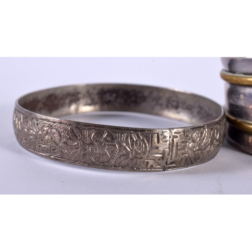 1446 - A Silver Bangle Stamped Israel 935 together with 3 others. (4)