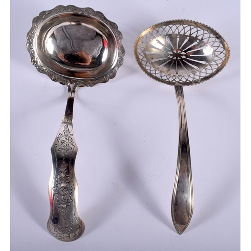 1448 - Two Silver Sifter Spoons.  Indistinct hallmarks.  Largest 15cm x 7.5cm,  total weight 63.7g (2)