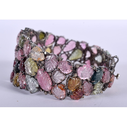 1452 - A Carved Tourmaline Bracelet.  19.5cm x 3cm, weight 41.5g