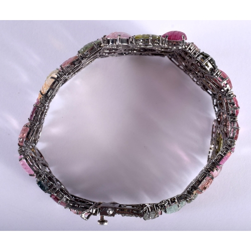 1452 - A Carved Tourmaline Bracelet.  19.5cm x 3cm, weight 41.5g