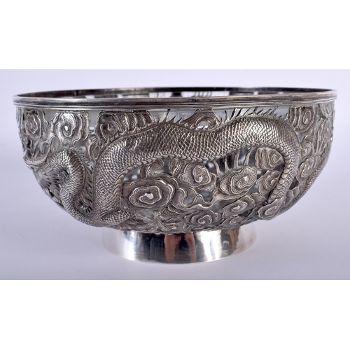 1460 - A 19TH CENTURY CHINESE EXPORT PIERCED SILVER BOWL by Wang Hing. Silver 433 grams. 18.5 cm diameter.