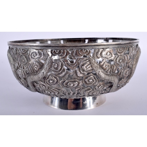 1460 - A 19TH CENTURY CHINESE EXPORT PIERCED SILVER BOWL by Wang Hing. Silver 433 grams. 18.5 cm diameter.