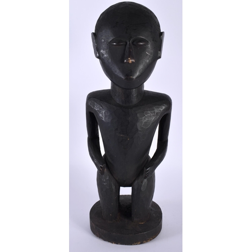 1514 - A LARGE AFRICAN TRIBAL FIGURE. 38.5 cm high.