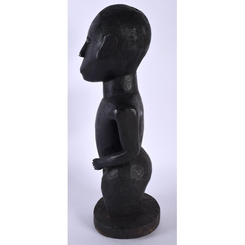 1514 - A LARGE AFRICAN TRIBAL FIGURE. 38.5 cm high.