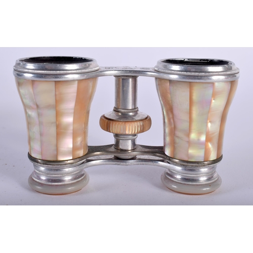 1999 - A Cased Pair of Mother of Pearl Opera Glasses. 10cm x 5.5cm