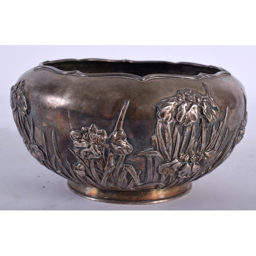 2002 - A LATE 19TH CENTURY JAPANESE MEIJI PERIOD EMBOSSED SILVER BOWL decorative in relief with flowers. 23... 