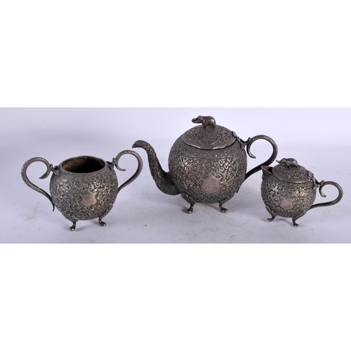 2007 - A 19TH CENTURY INDIAN SILVER THREE PIECE TEASET decorative in relief with foliage and vines. 790 gra... 