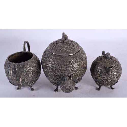 2007 - A 19TH CENTURY INDIAN SILVER THREE PIECE TEASET decorative in relief with foliage and vines. 790 gra... 