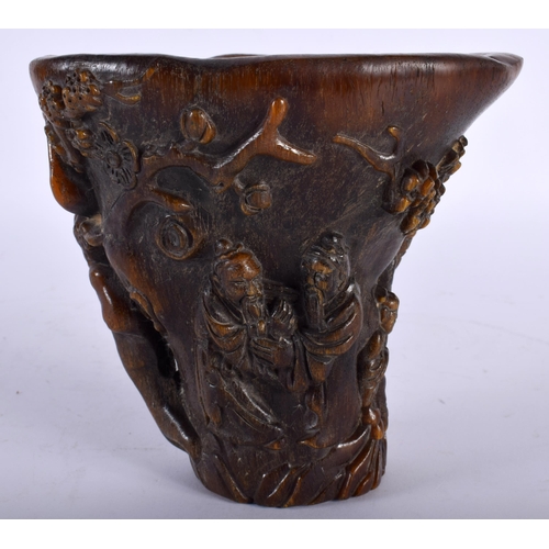 2653 - A CHINESE CARVED BUFFALO HORN TYPE LIBATION CUP 20th Century. 806 grams. 15 cm x 15 cm.