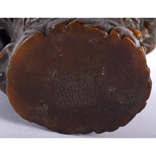 2653 - A CHINESE CARVED BUFFALO HORN TYPE LIBATION CUP 20th Century. 806 grams. 15 cm x 15 cm.