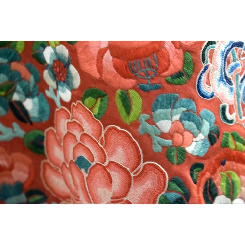 2825 - A LATE 19TH CENTURY CHINESE SILK EMBROIDERED RED GROUND SKIRT Qing. 230 cm x 80 cm.