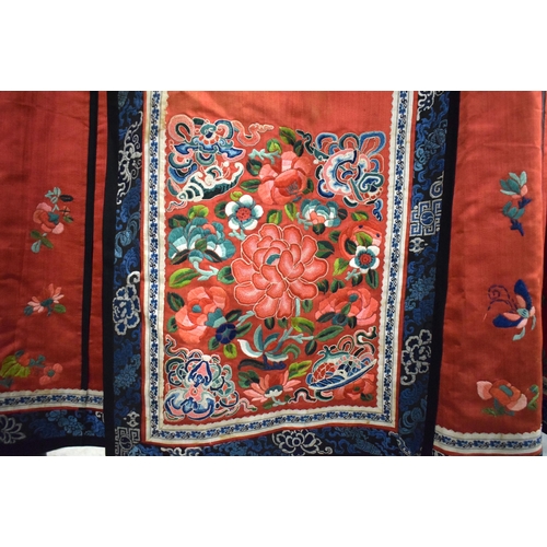 2825 - A LATE 19TH CENTURY CHINESE SILK EMBROIDERED RED GROUND SKIRT Qing. 230 cm x 80 cm.