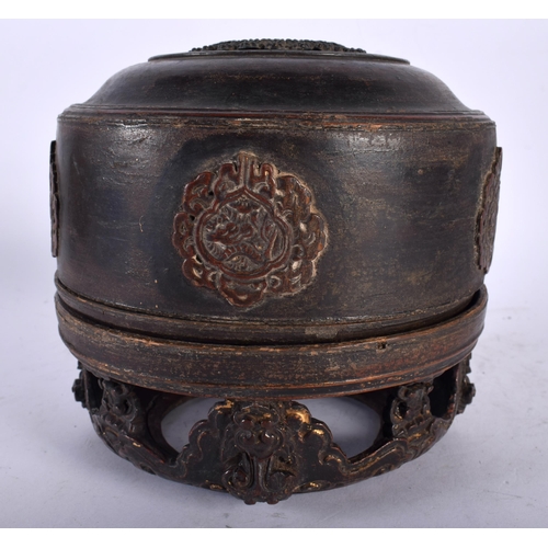 2828 - A RARE 18TH/19TH CENTURY TIBETAN CARVED WOOD BOWL ON STAND. 18 cm x 12 cm.