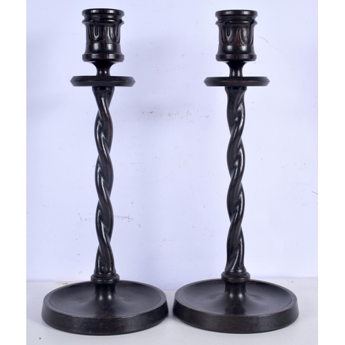 3001 - A pair of 1920's wooden barley twist candlesticks 39 (2).