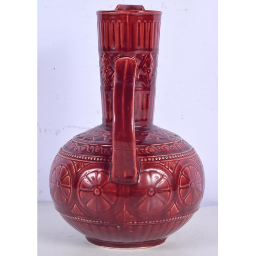 3002 - A Christopher Dresser glazed pottery jug, Samuel Lear Aesthetic movement design  Circa 1880 24 cm.