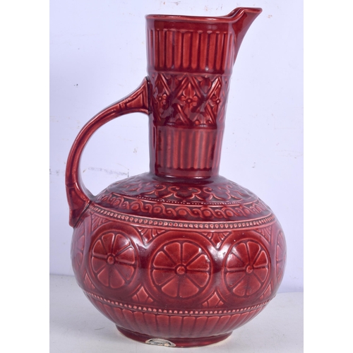 3002 - A Christopher Dresser glazed pottery jug, Samuel Lear Aesthetic movement design  Circa 1880 24 cm.