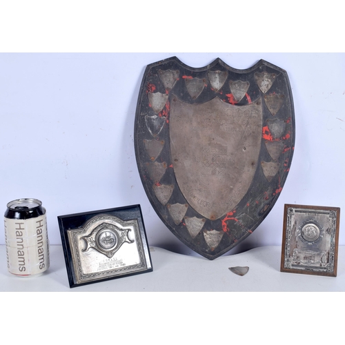 3010 - A Mid Century London School swimming trophy shield together with 2 smaller shields 33 x 27 cm.(3).