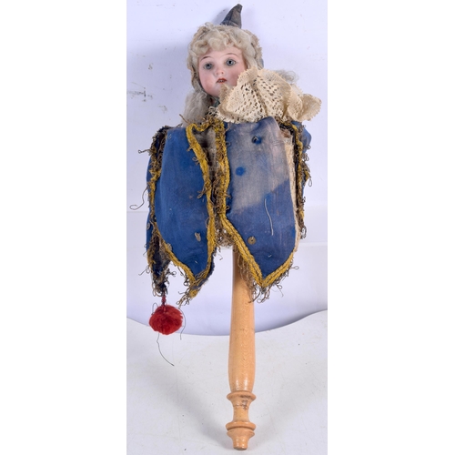 3013 - A Victorian Marotte spinning Bisque head doll 36 cm.