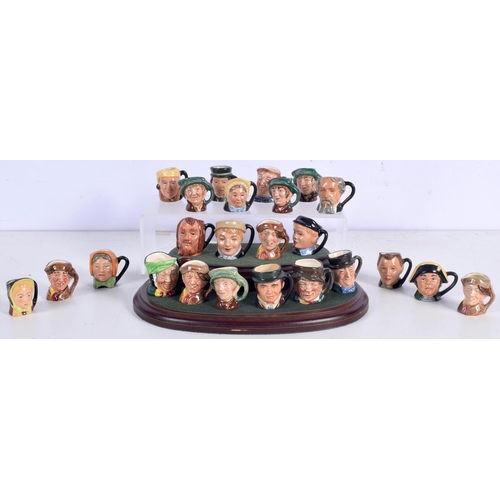 3016 - A collection of Miniature Royal Doulton Character jugs together with a stand (Qty)