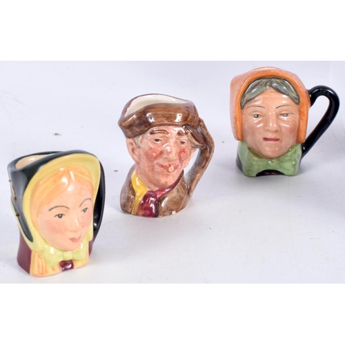 3016 - A collection of Miniature Royal Doulton Character jugs together with a stand (Qty)