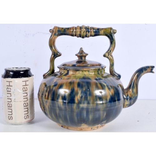 3021 - A Dunmore style glazed pottery Tea pot 21 cm.