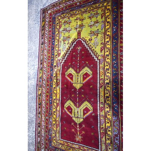 3023 - An Anatolian prayer rug 230 x 142 cm.