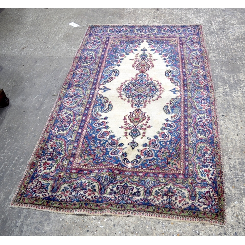 3026 - A Persian Kirman 215 x 123 cm.