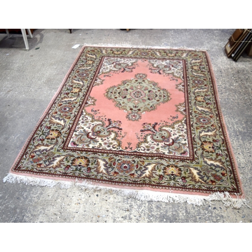 3031 - An Oriental rug 240 x 168 cm.