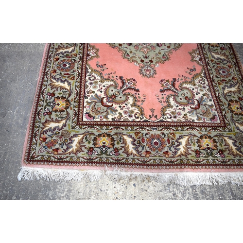 3031 - An Oriental rug 240 x 168 cm.