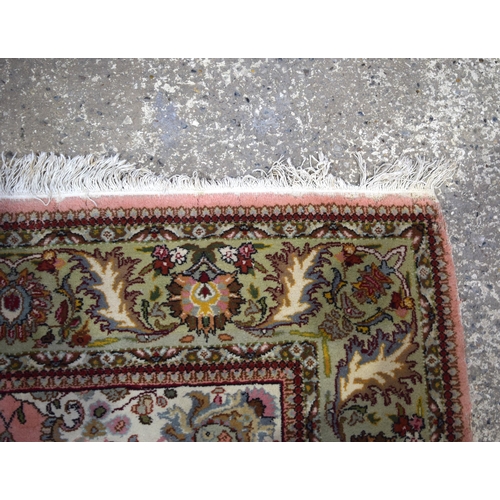 3031 - An Oriental rug 240 x 168 cm.