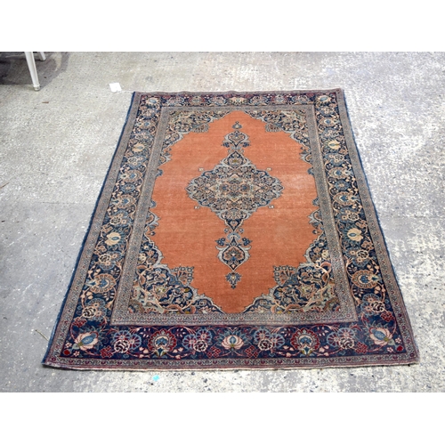 3032 - A Persian Kashan rug 210 x 135 cm.