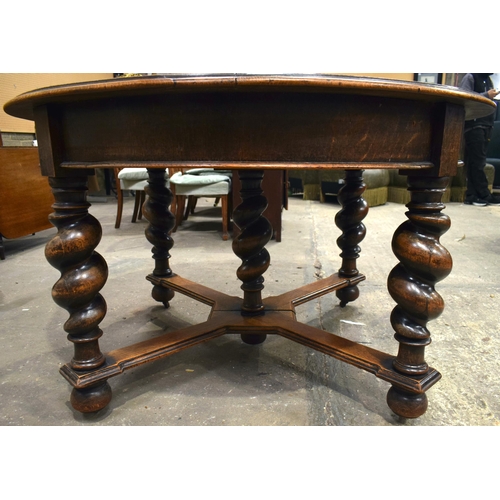 3061 - A LARGE OAK BARLEY TWIST DINING TABLE. 130 cm x 75 cm.