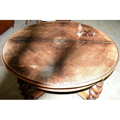 3061 - A LARGE OAK BARLEY TWIST DINING TABLE. 130 cm x 75 cm.