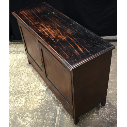 3062 - A STAINED WOOD TWO DOOR CABINET. 105 cm x 70 cm x 35 cm.