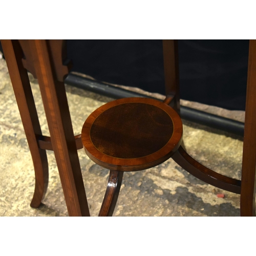 3071 - AN EDWARDIAN MAHOGANY TABLE and a small three legged table. Largest 70 cm x 47 cm. (2)