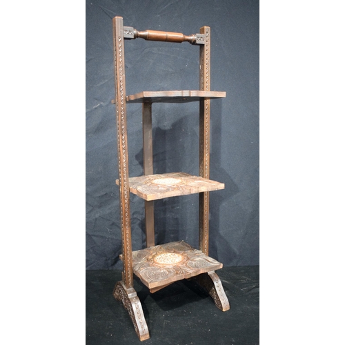 3160 - A Three tier Anglo Indian carved wood and inlaid central stands 77 x 28 cm.